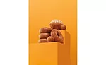 Dunkin' apple cider doughnut and MUNCHKINS, pumpkin doughnut, and pumpkin muffin