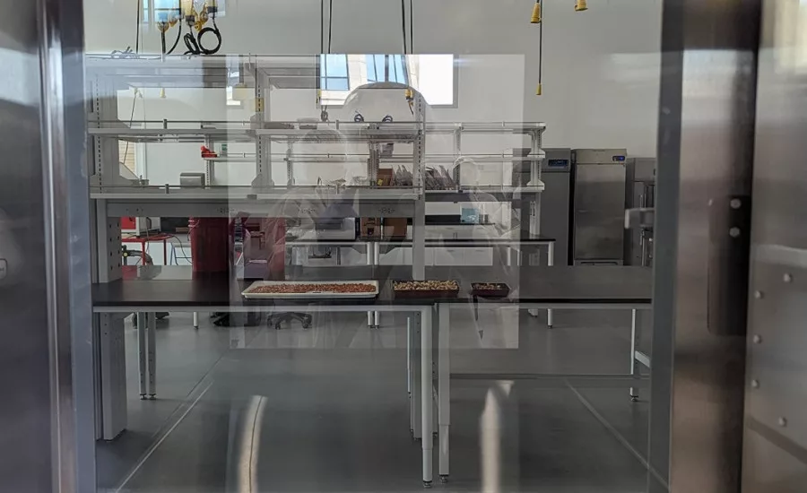 A pass-through window connects the Roasted Nut Room