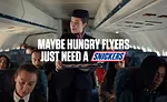 Snickers flight ad campaign 2024