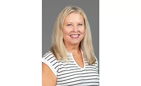 Shelly Clarey accepts NCA's 2025 Woman of Influence Award