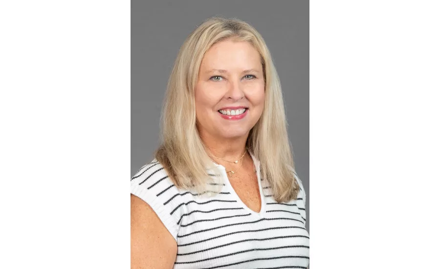 Shelly Clarey accepts NCA's 2025 Woman of Influence Award