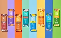 IQBAR_lead.jpg Several IQBAR protein bars on multicolored background