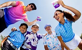 Children and adults wearing colorful clothes, shot from below