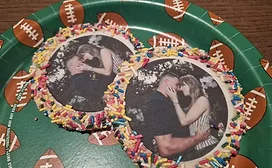 Cookies with Taylor Swift and Travis Kelce on a football plate