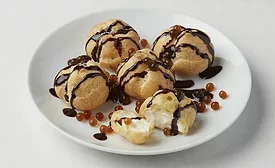 Plate of baked goods adorned with boba balls