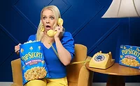 Melissa Joan Hart chats on phone with Pop Secret popcorn