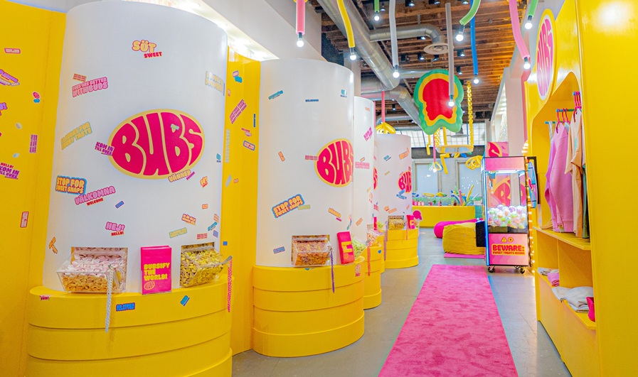 Colorful yellow and pink candy store interior