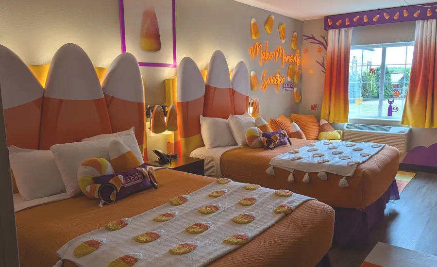 Hotel room decorated in candy corn theme