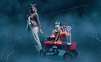 PVM_decoy.jpg Child robot in Frankenstein costume with adult woman