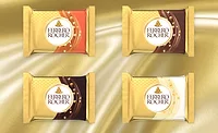 ferrero rocher chocolate squares gold background