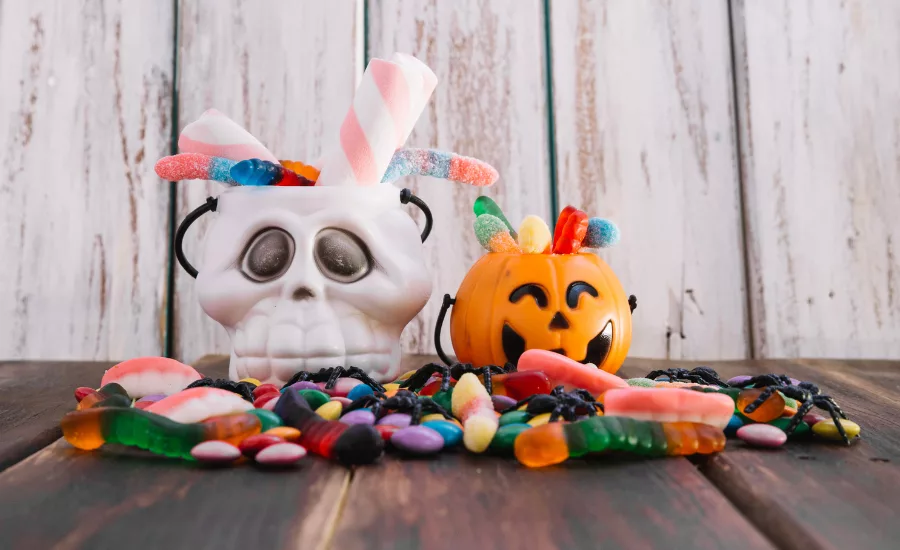 tick or treat buckets filled with candy