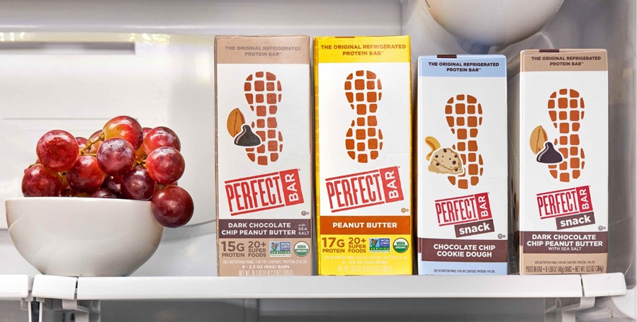 Cartons of Perfect Bar snacks in refrigerator
