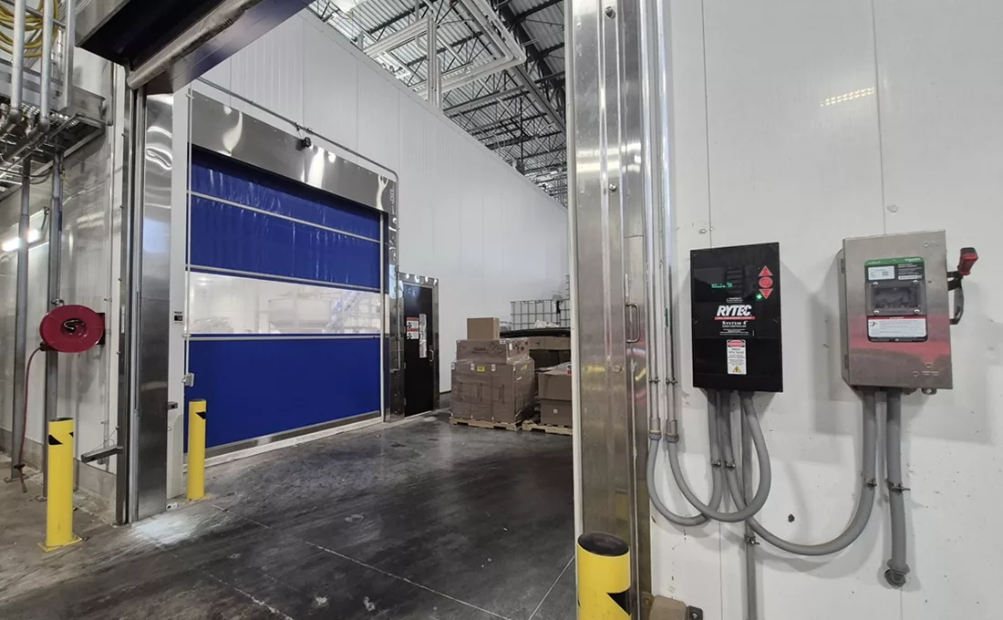 Blue overhead door and Rytec controls in snack facility