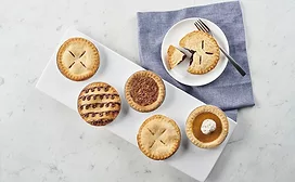 Pies and baked goods on a table