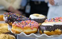 Embassy_lead.jpg Assorted, multicolored doughnuts on a table