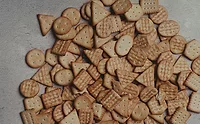 Cargill pexels-sylwester-ficek-154797634-31617910.jpg Pile of different cracker shapes on a table