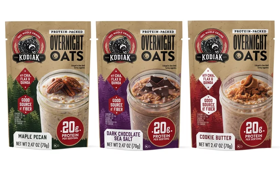Three multicolored pouches of Kodiak Overnight Oats