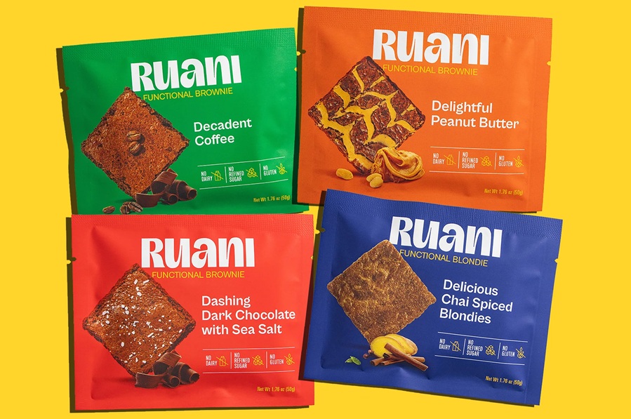 Four packs of Ruani brownies on yellow background