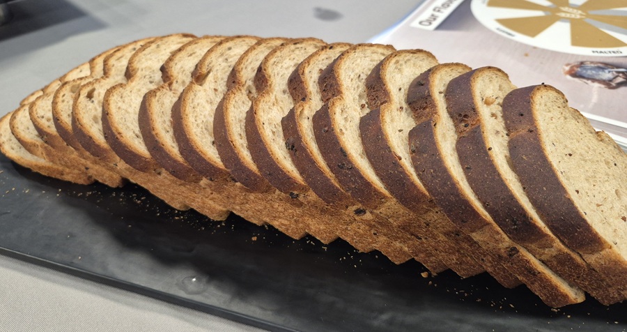Sliced loaf of bread on a slate