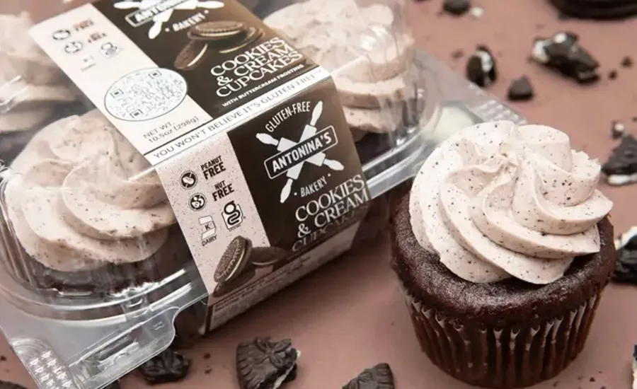Clamshell container of Antonina's cookies and cream cupcakes