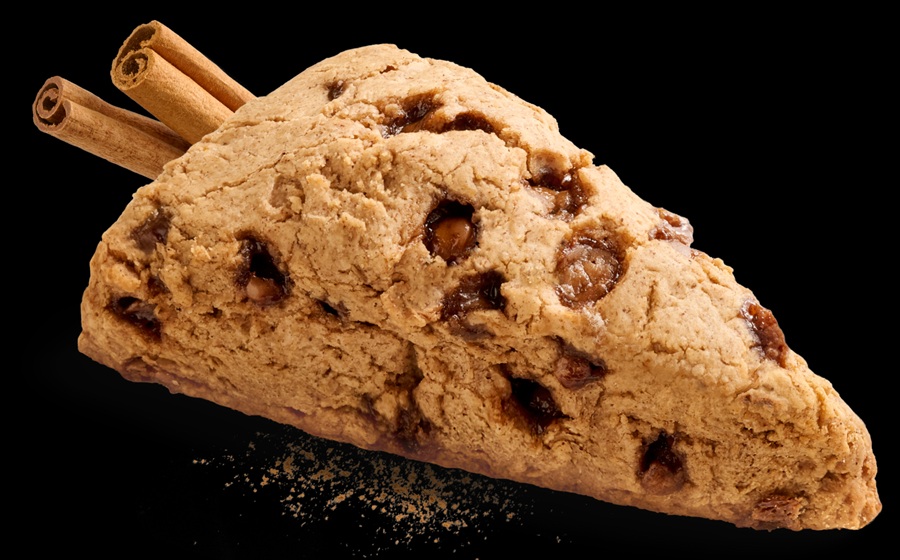 Chocolate chunk scone on a black background