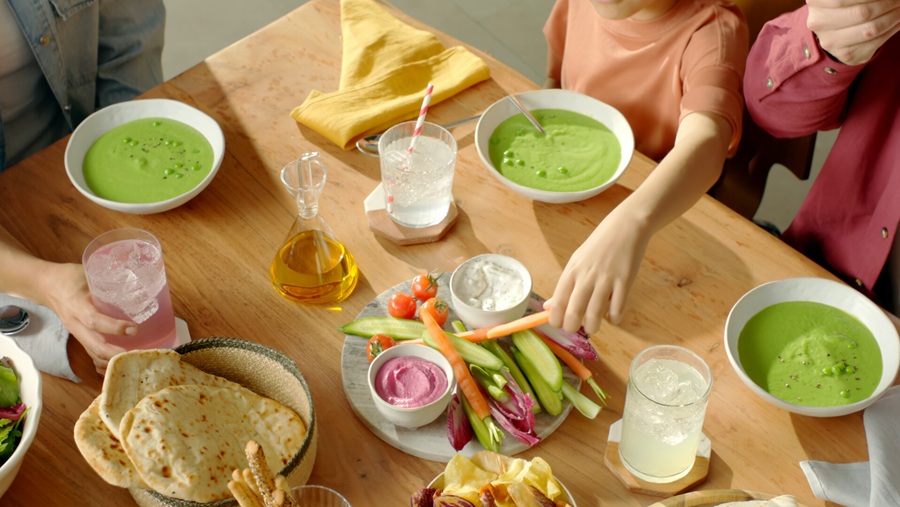 Chips and other foods on a wood table