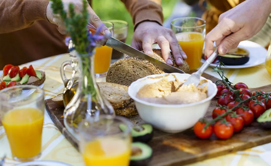Various baked goods and treats on a wood table