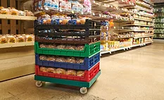 Multicolored bakery trays in a grocery store