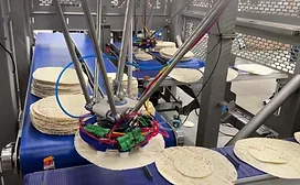 Robotic equipment denesting and stacking tortillas