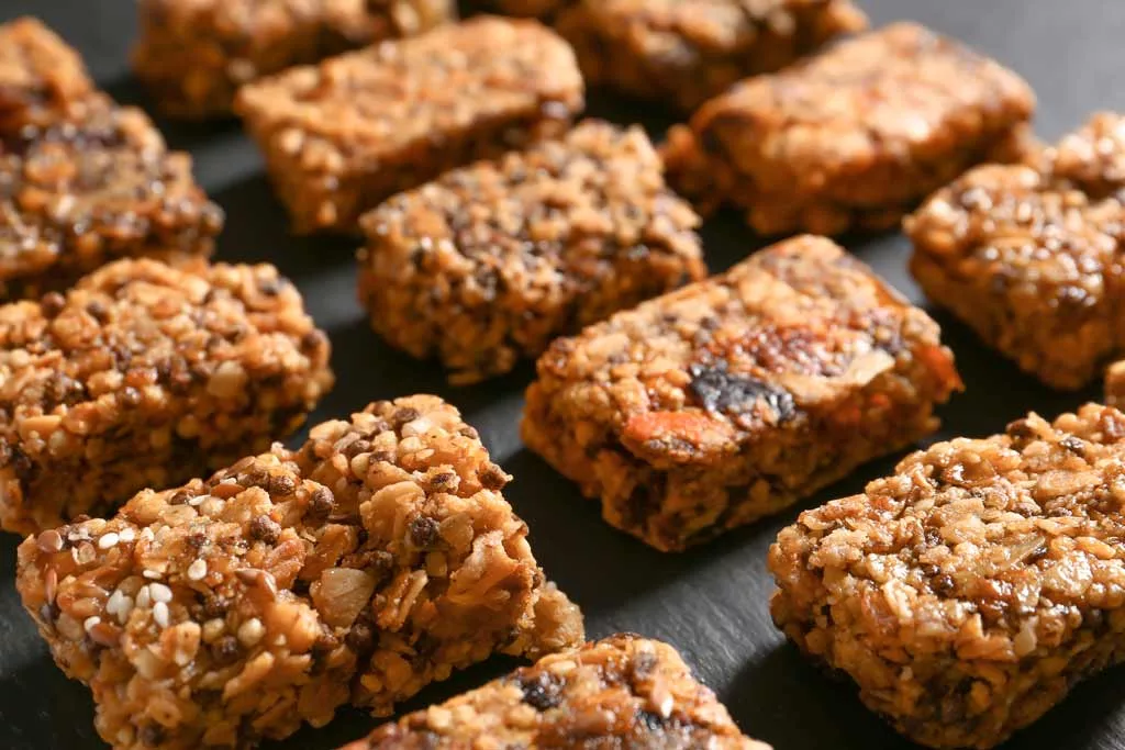 An array of multigrain bars on a sheet