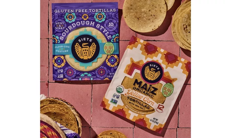 Packages of Siete tortillas on a colorful tabletop