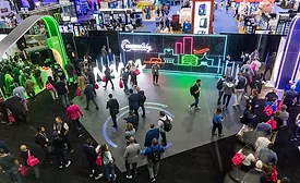 Attendees milling about an expo exhibit floor