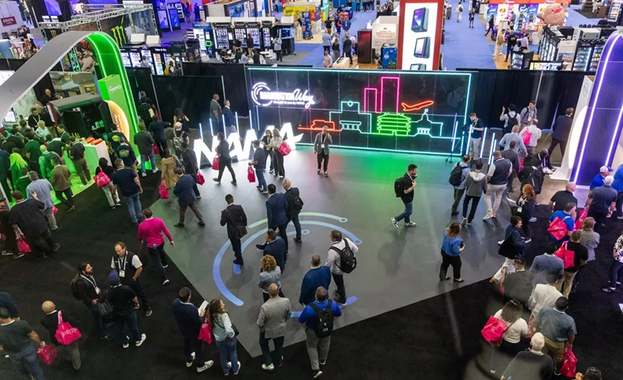 Attendees milling about an expo exhibit floor