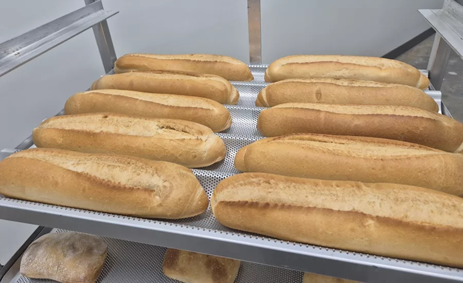 Baguettes on a tray in a speed rack