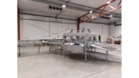 TOMRA Food debuts KETE16 robotic packing machine for punnetts and clamshells