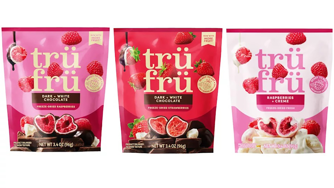 Three packages of Trü Frü hyper-dried line in Dark Chocolate Raspberry, Dark Chocolate Strawberry, and Raspberries & Creme.