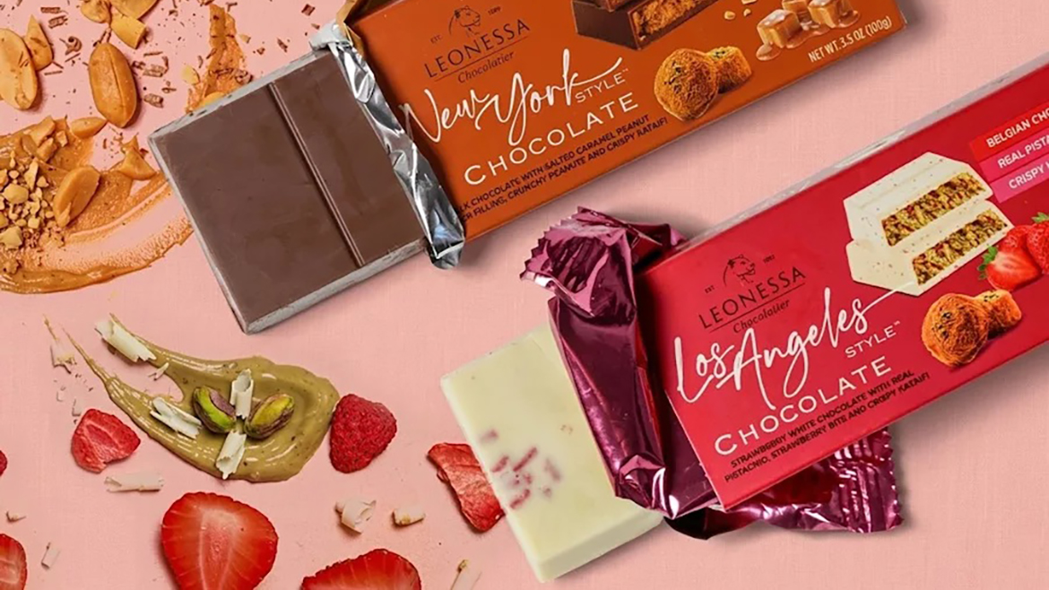 eonessa Chocolatier World Cities Collection: (top) New York, milk chocolate ﬁlled with salted caramel and peanut butter, and (bottom) Los Angeles, white chocolate and strawberry bar.