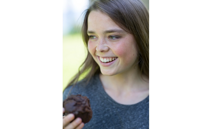 Girl eating muffins