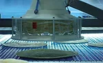 Product handling for secondary packaging goes robotic
