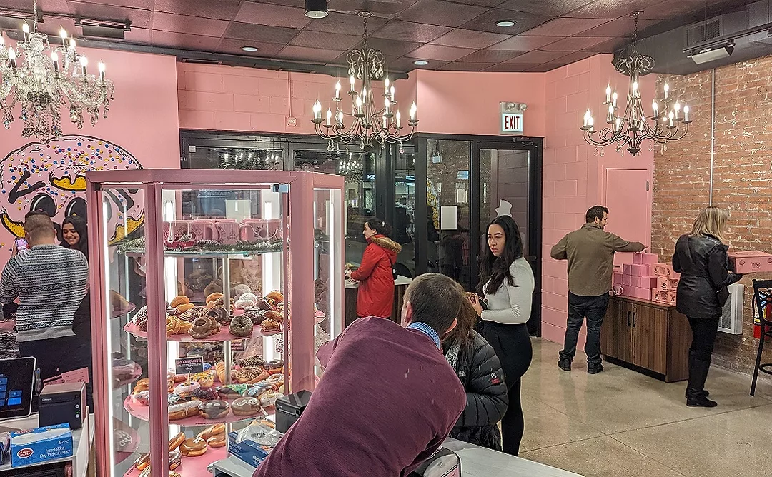 Before the Chicago Voodoo Doughnut’s official December 16 opening, local leaders, members of the press, and other VIPs were invited to a pre-opening gathering on December 14 to try the wares.