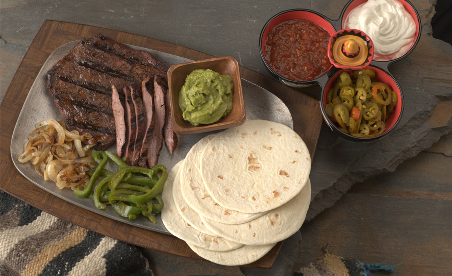 steak, guacamole, bell peppers, and tortilla