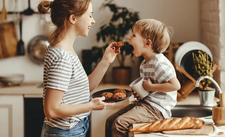 mother feeding her child
