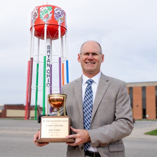 kirk vashaw, holding an award