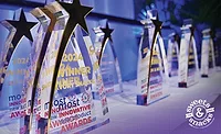 2024 winner awards lined up on a table