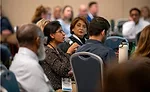 woman asking question at the summit