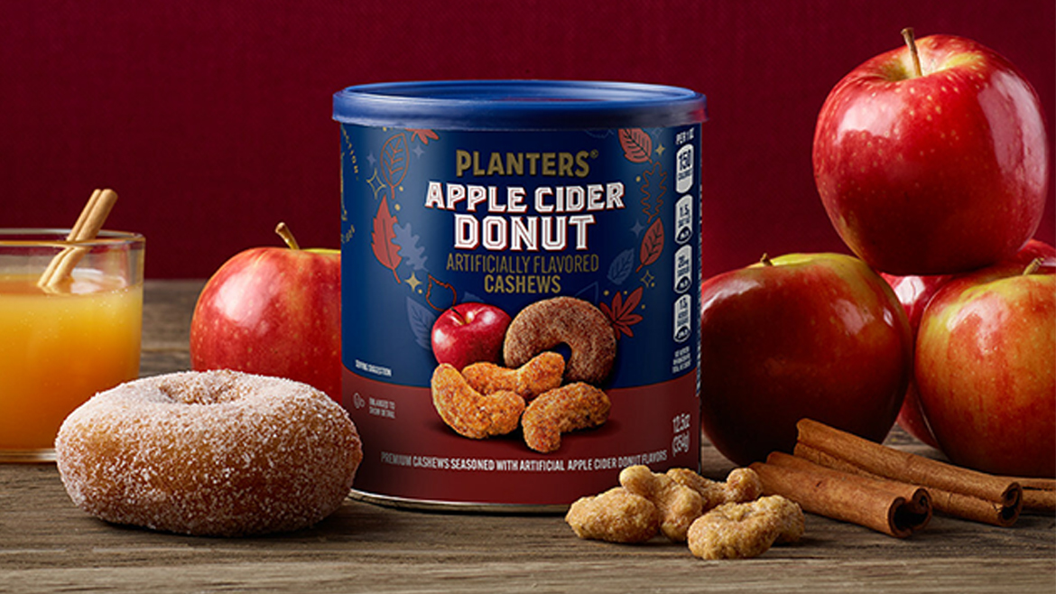 Can of Planters Apple Cider Donut cashews on decorated table