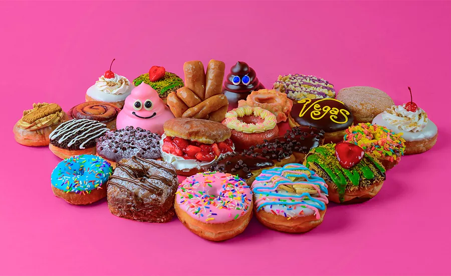 a collection of assorted doughnuts from Pinkbox Doughnuts