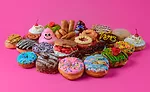 a collection of assorted doughnuts from Pinkbox Doughnuts