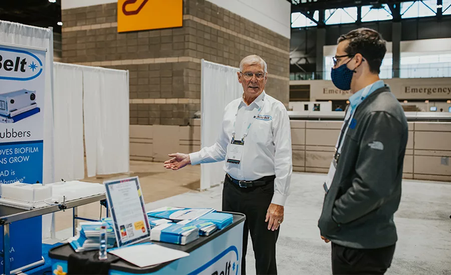 an interaction at a trade show or expo booth
