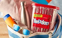 a large container of Twizzlers Strawberry Flavored Twists candy. 